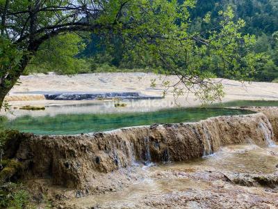 the Azalea Reflection Pools in Huanglong Valley