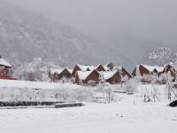 Snow-covered Lodge in Xiling Snow Mountain